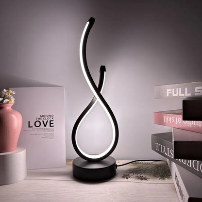 A modern wrought iron table lamp powered by USB - three tone light