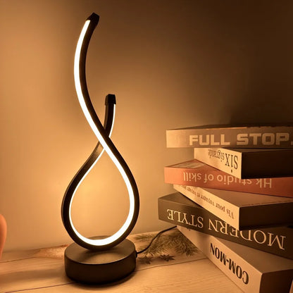 A modern wrought iron table lamp powered by USB - three tone light