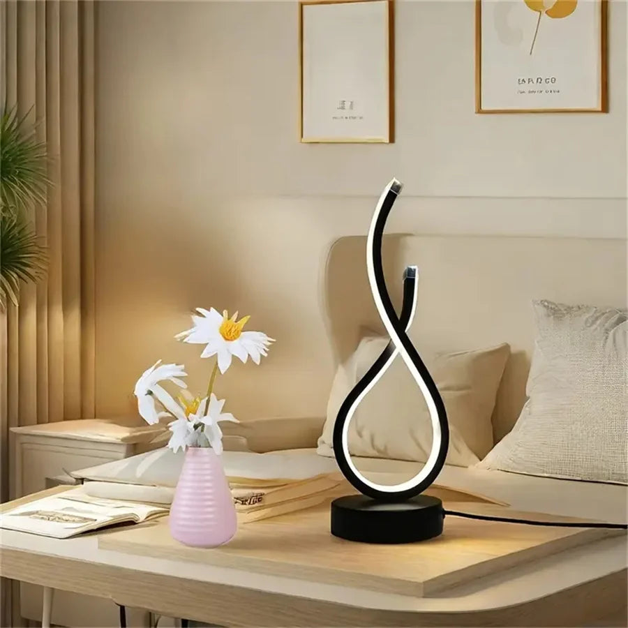 A modern wrought iron table lamp powered by USB - three tone light
