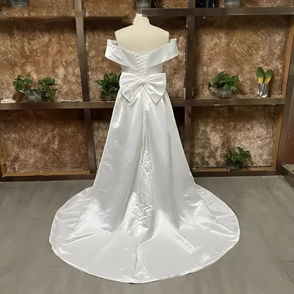 Satin V Neck Plus Size Wedding Dresses Off The Shoulder Lace Up Back Big Bow Pleated Bridal Gown with Pockets and Court Train